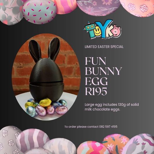 Promotional image of a chocolate egg with bunny ears, surrounded by Easter eggs, on a black background with 'Toyko' branding.