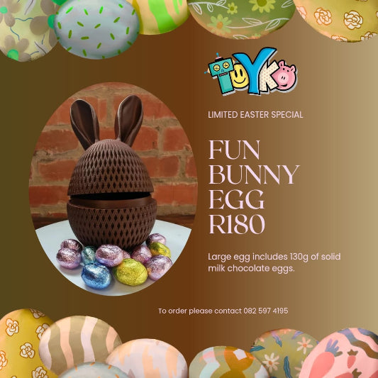 Promotional image of a chocolate egg with bunny ears, surrounded by Easter eggs, on a brown background with 'Toyko' branding.