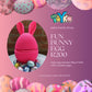 Promotional image of a chocolate egg with bunny ears, surrounded by Easter eggs, on a pink background with 'Toyko' branding.