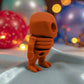 Tiny Alien Skeleton Silk Red Copper - Side